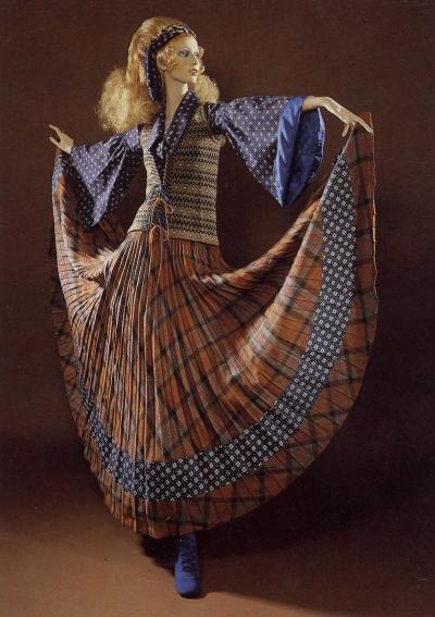1970 Bill Gibb: Plaid skirt, blouse, waistcoat by Kaffe Fassett, boots by The Chelsea Cobbler. Selector: Beatrix Miller, Vogue