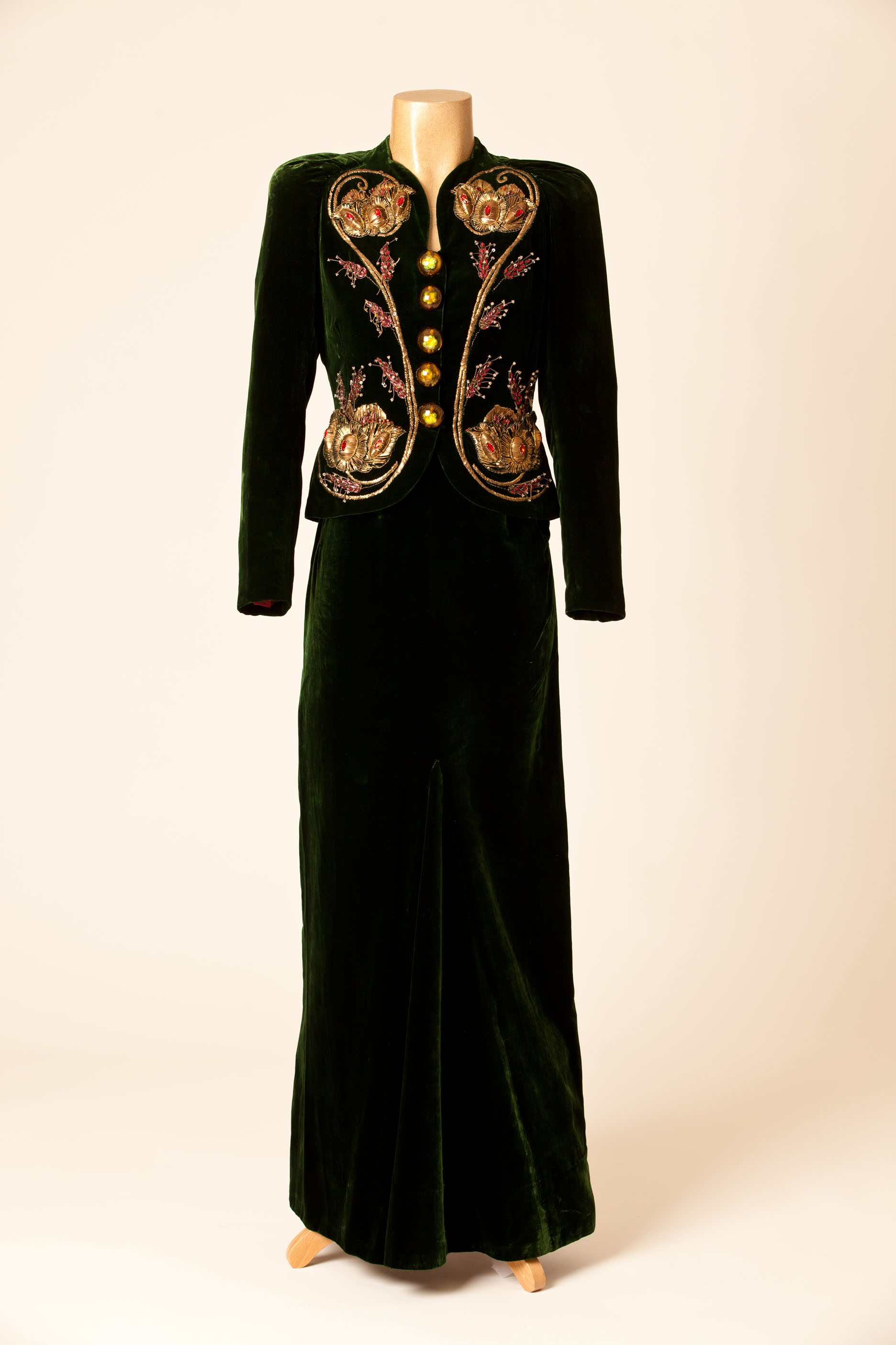 Image: Dark green velvet dress and jacket ensemble by Elsa Schiaparelli 
