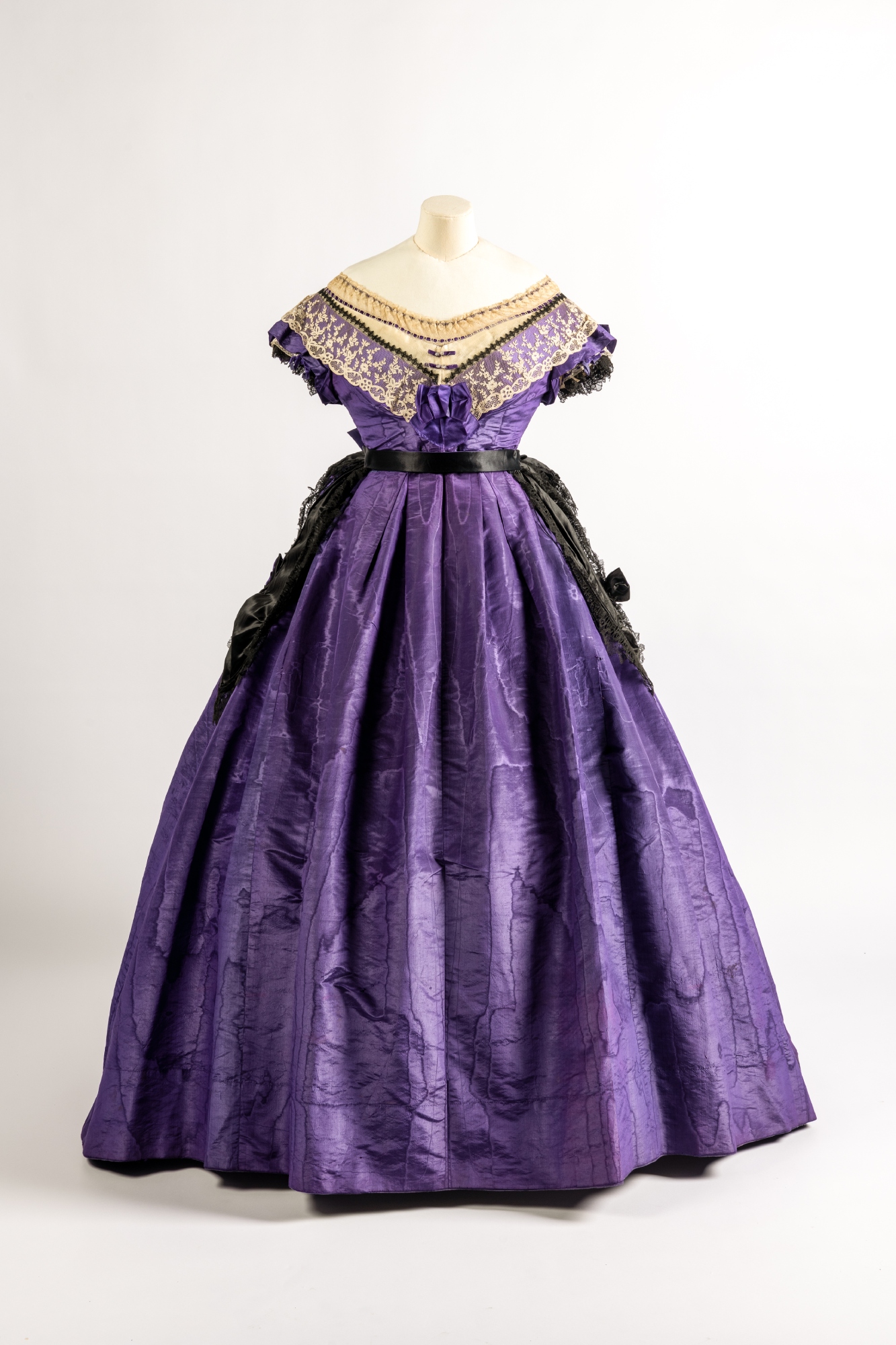 A mid Victorian purple silk dress from the Fashion Museum Bath collection