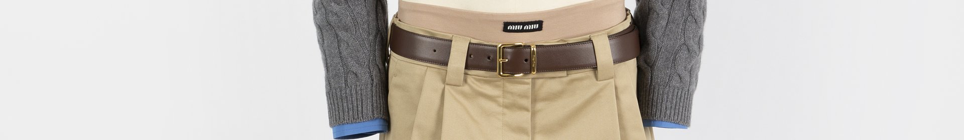Image: The Miu Miu micro mini skirt worn with a brown belt