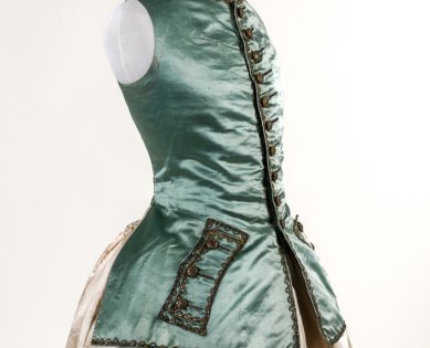 An 18th century blue silk woman’s waistcoat with military-style gold metal thread embroidery