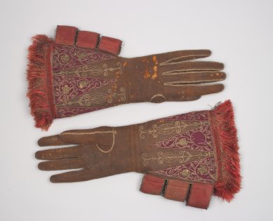A pair of elaborately embroidered brown leather gloves once owned by King James I appear in The World of King James VI & I at the National Galleries of Scotland: Portrait Gallery