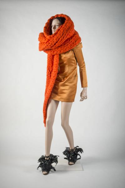 2007 Giles: Orange giant knit scarf and silk satin dress, shoes by Gina. Selector: Hywel Davies