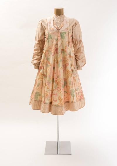 11 Woman's ensemble: pinafore skirt and blouse