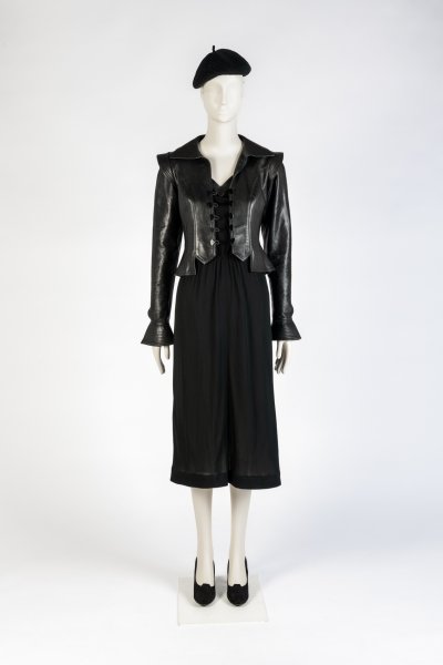 Black jersey dress, beret and tailored leather jacket