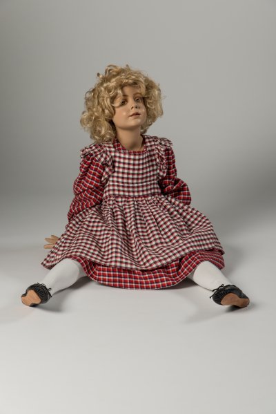 Girl’s checked cotton dress and pinafore