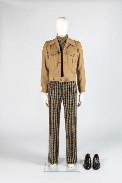 Man’s jacket and checked trousers