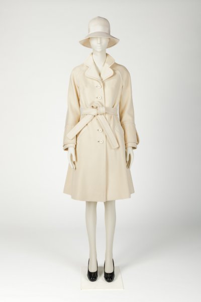 Woman’s white wool coat and matching hat