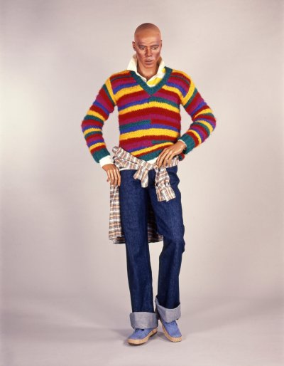 Man’s jeans and striped hand-knitted jumper